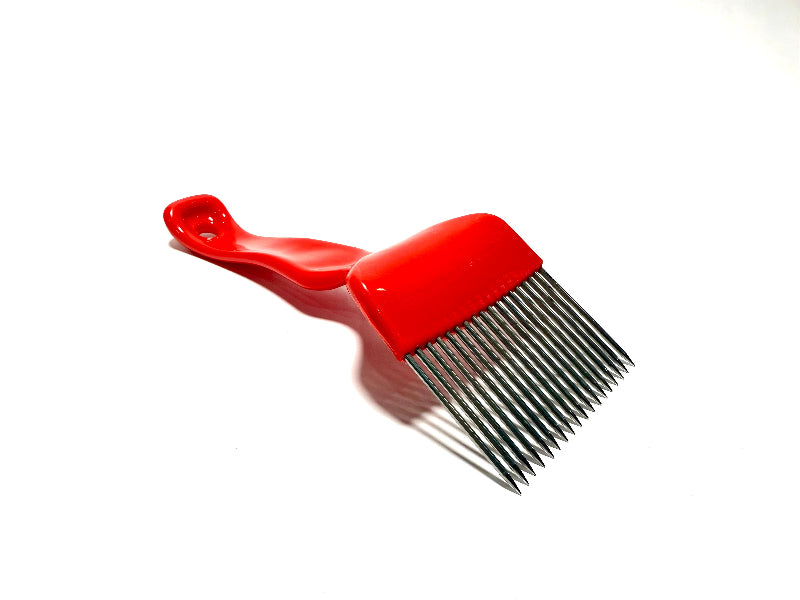 red plastic uncapping fork